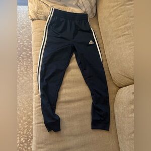 Navy 3 stripe adidas pants. 10/12. Inner drawstring. Pockets. Cuffed ankle